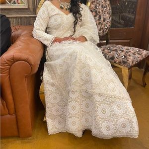 New White colour lehenga with net dupatta